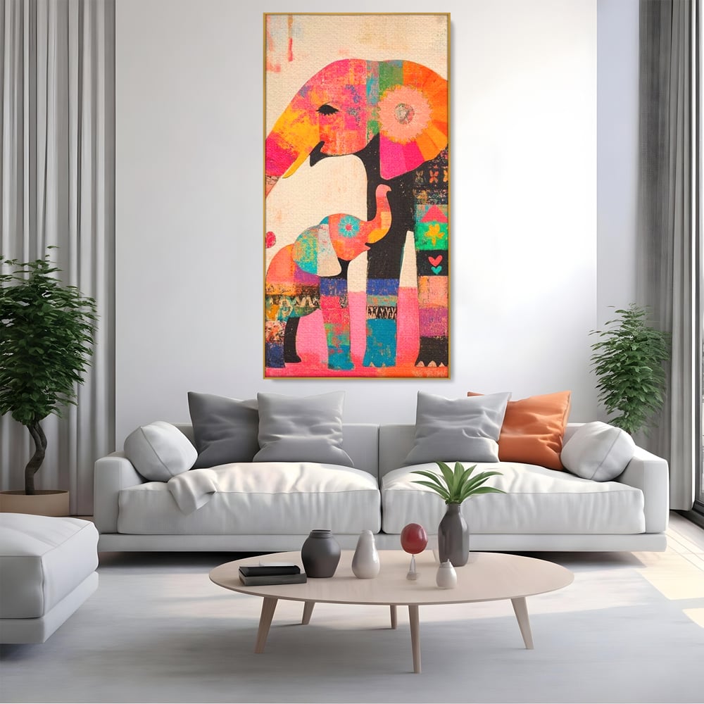 Tablou canvas cu tablou pictura cu elefanti colorati, in rama de aluminiu auriu, pe perete intr-un living